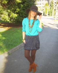 Green blouse and tweed skirt