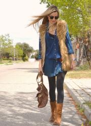 Denim dress and fur vest