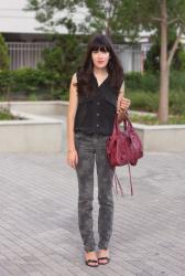 sleeveless blouse and faded floral jeans
