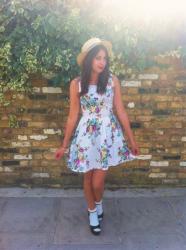 Straw boater and frilly socks