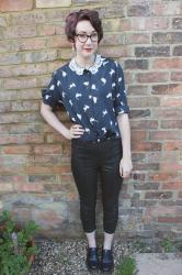 cat print shirt and snakeskin trousers