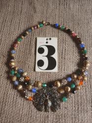 A peacock, Anthropologie, and vintage beads - the perfect combination in my mind!
