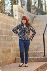 A Casual Zebra Blouse, Jeans, & Studded Flats Outfit