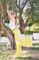 YELLOW FLARE PANTS AND GLADIATOR HEELS