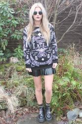 jumper, black mini skirt & camo socks