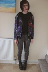 floral bomber and shiny trousers