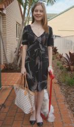 Printed Dress, Louis Vuitton Damier Neverfull | Dog Print Blouse, Red Skinnies, Balenciaga Part Time Bag