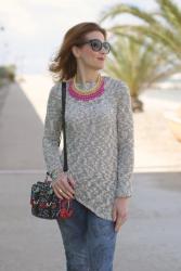 Grey sweater and a print messenger bag