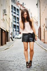 crochet top and leather shorts