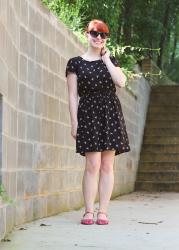 A Kids' Bow Dress, Pink Sandals, and Cat Eye Sunglasses