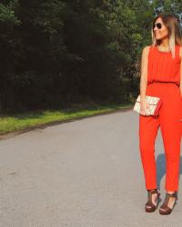 Red jumpsuit.