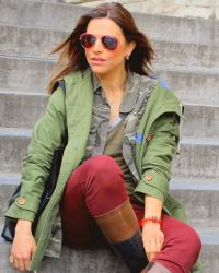 Khaki parka with burgundy pants 