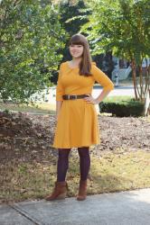 A Jeanie Outfit: Mustard Oasap Dress, Purple Tights, & Fringe Boots