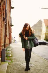 warm parka and black overknees