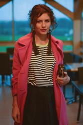 Pink coat and black white stripe!