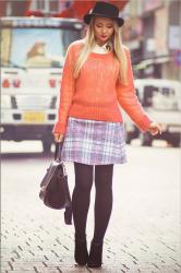 Tartan skirt and pink sweater
