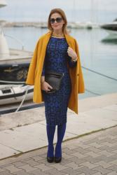 Mustard coat, blue dress