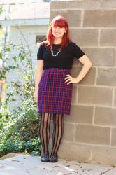 Pink & Purple Plaid Skirt, Black Sweater, & Vertically Striped Tights