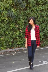 A red plaid shirt and skinny jeans