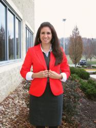 A little reddish orange blazer…