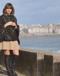 Botas altas y poncho