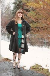 A Jeanie Holiday Outfit: Vintage Wool Coat, Green Peplum Dress, & Floral Tights