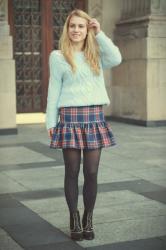 Baby blue sweater and checked skirt