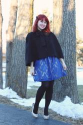 A Holiday Outfit: Blue Lace Dress, Black Capelet, and Sparkly Heels