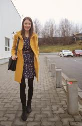 amber coat and leopard dress