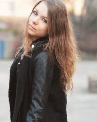 Black coat and flowers.