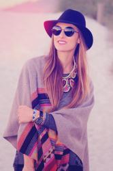 PONCHO, HAT & ROUND SUNGLASSES