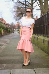 SUNGLASSES AND A PINK FRILLY SKIRT!