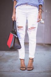 Ripped Jeans and Leather Baseball Cap