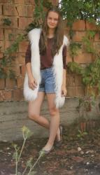 White fur vest