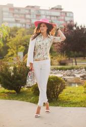 WHITE SUIT AND FLORAL DETAILS
