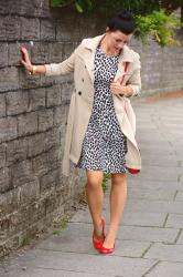 Leopard print dress with a classic trench and red accents