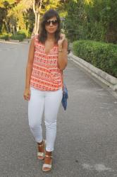 Orange blouse and golden sandals