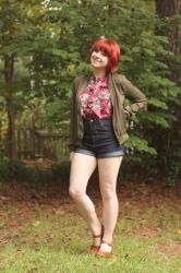Outfit: Floral Top, Olive Green Jacket, High Waisted Denim Shorts, and Clogs