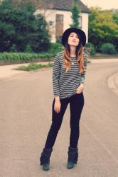 Striped top, fringed boots