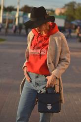 Hat, hoody and heels. 