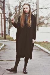 Black longline coat.