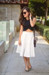 White faux leather skirt.
