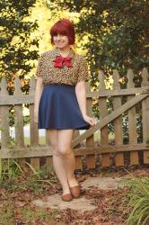 Outfit: Leopard Print Shirt with a Red Scarf Bow and Navy Blue Skater Skirt