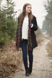 black coat & christmas scarf.