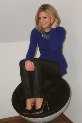 Holiday ensemble: cobalt blue against leather pants