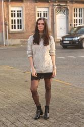 90s style in cable knit, slip skirt and chunky boots