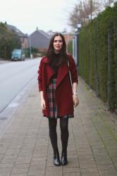 Burgundy cardigan, pleated plaid skirt