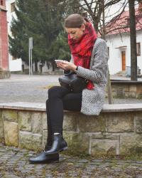 oversize houndstooth coat with red tartan scarf