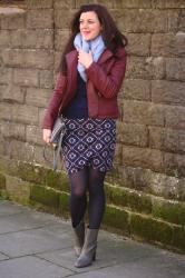 An easy to wear skirt, and a burgundy biker jacket