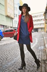 dark blue dress with wine red coat